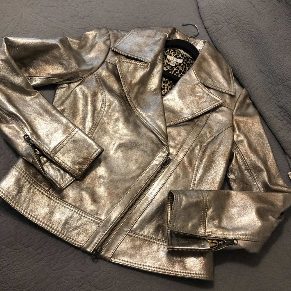 CACHE’ ..... leather jackets.
